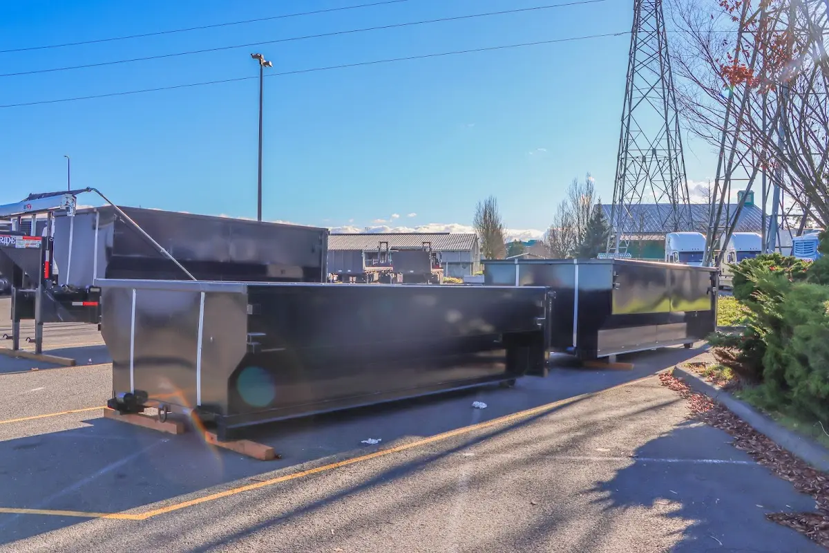 Roll-off dumpster ready for waste disposal at job site for 4 Yard Dumpster Rental in Mount Airy